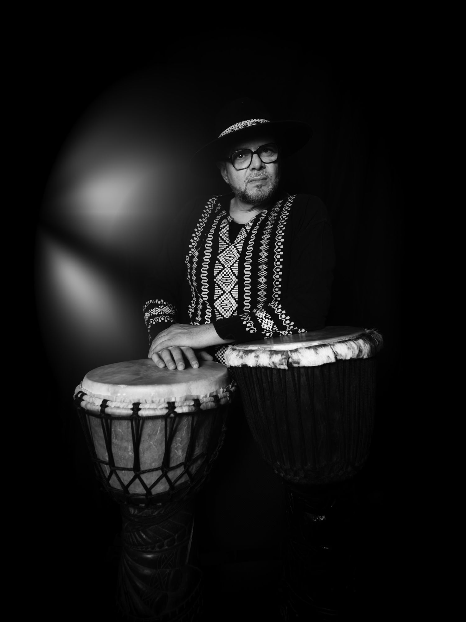 Master M with djembé pair