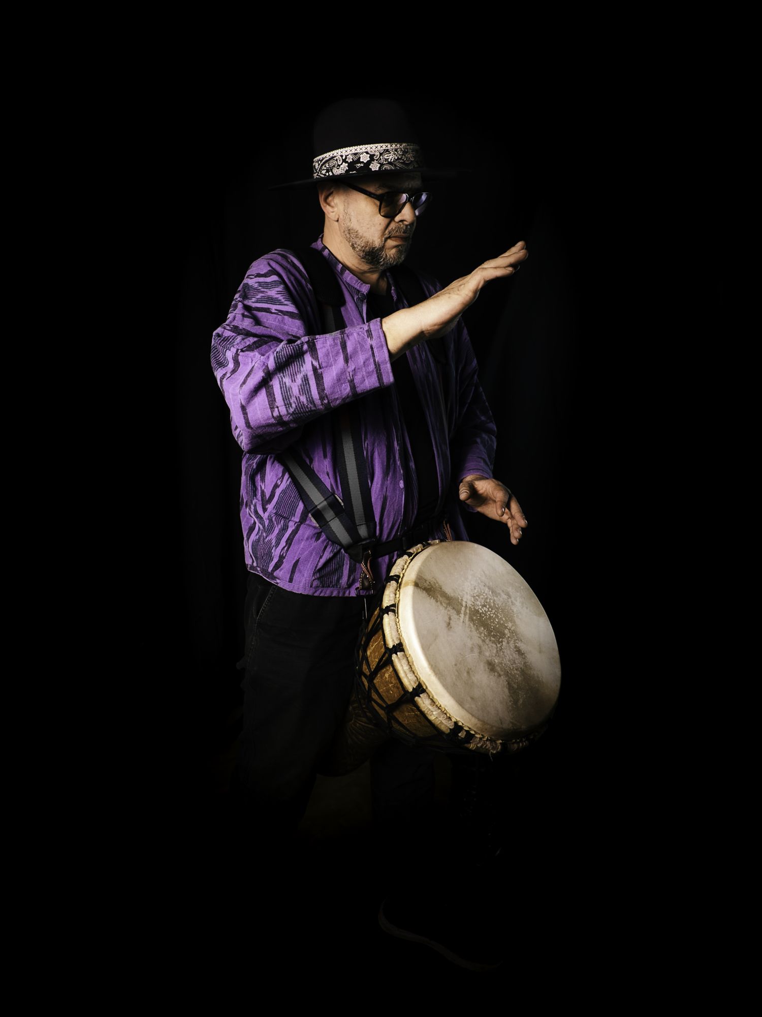 Master M with djembé, purple jacket