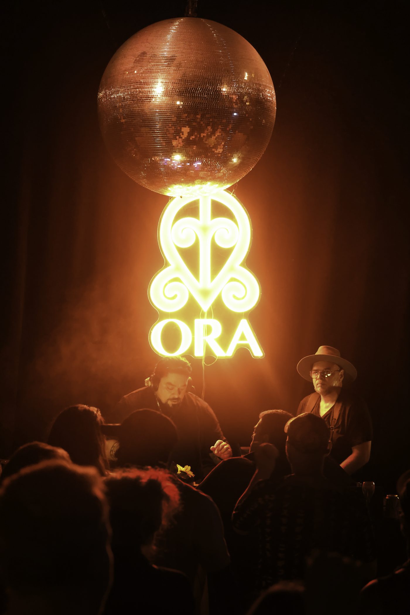 ORA night at Weetamix, the ORA neon and the duo behind the decks