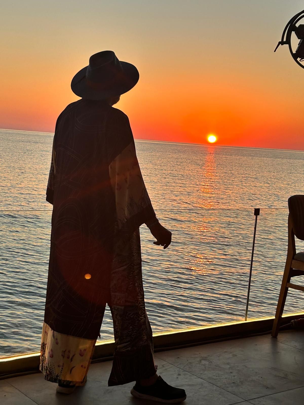 Master M walking at sunset